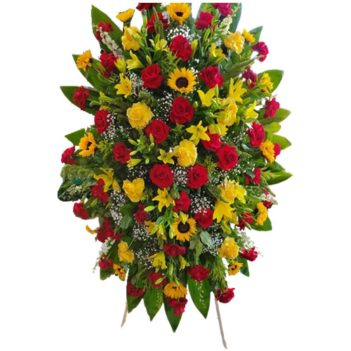 Spray red and yellow roses, yellow lilies, sunflowers, white larkspur, solidago, baby's breath, tilips and lemon