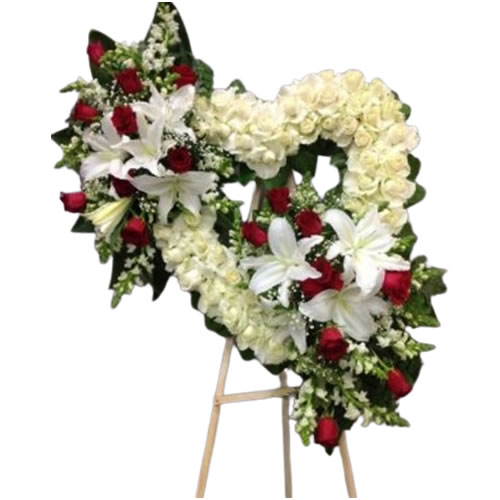 Large heart filled with white rose with 2 bouquets of red rose, lily and snap