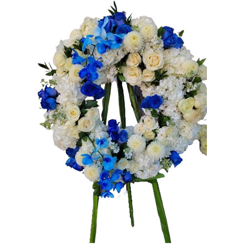 Large crown with mixed flowers and white and blue colors