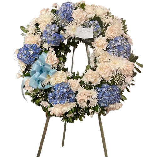 Large wreath with mixed flowers with white and blue colors