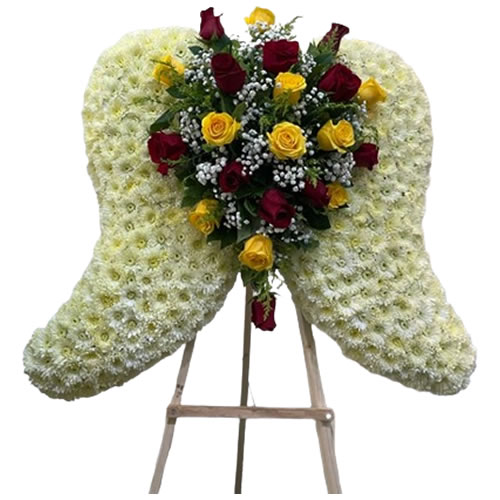 Medium wings, white cushion, yellow roses, red roses, baby's breath and solidago